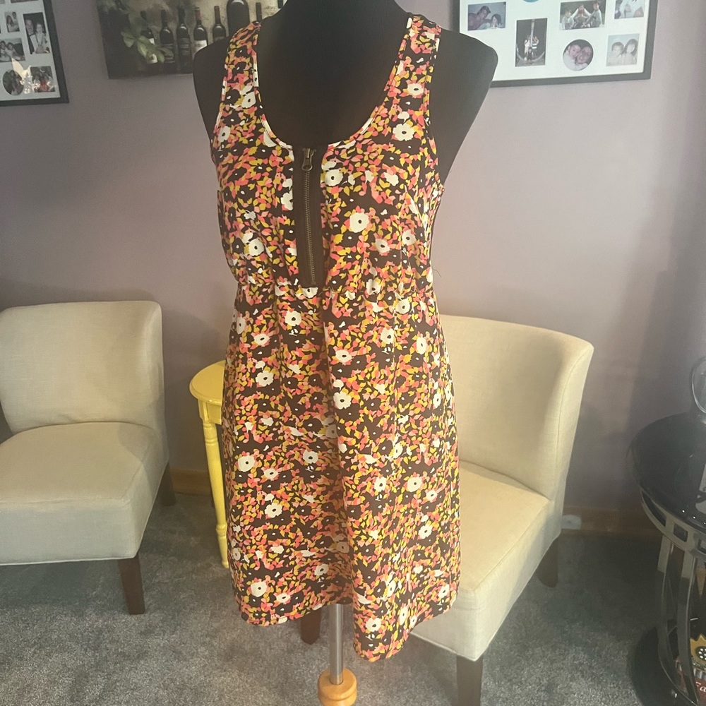 Floral dress with zip front and lace racer back.